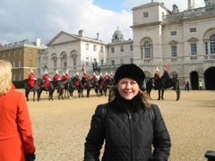 Miss Deborah in front of Buckingham Palace
